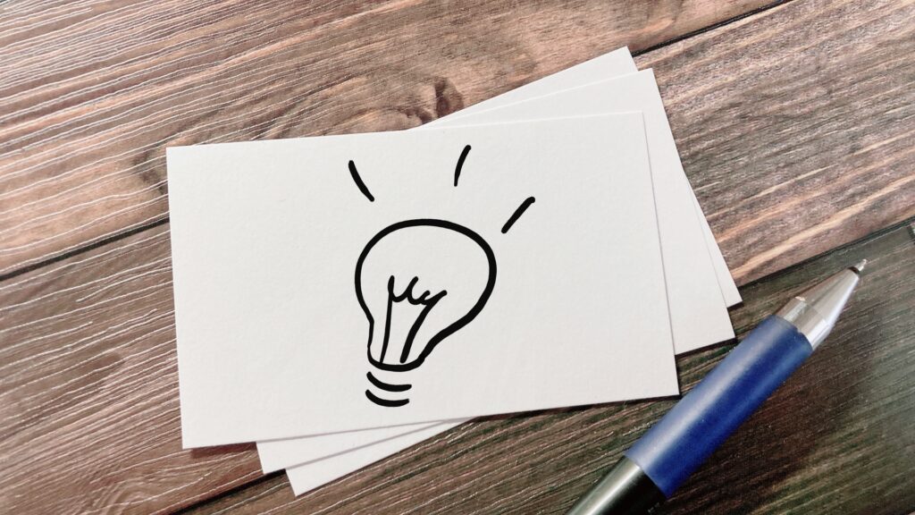 紙に電球が書かれている画像