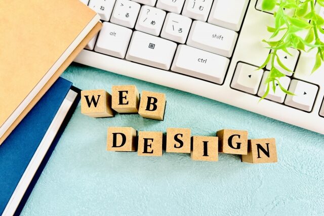 WEB DESIGNのサインとPC
